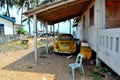 Classic German Volkswagen Beetle yellow car parked under shelter in Pattani Thailand Royalty Free Stock Photo