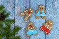 Classic Gingerbread man on a wooden vintage background. Homemade ginger cookies or Christmas. sweet treats for new year holidays.