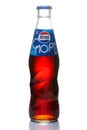 Classic glass bottle of soft drink Pepsi-Cola isolated on a white background. American multinational food and beverage company Royalty Free Stock Photo