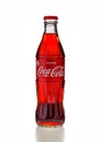 Classic glass Coca-Cola bottle with a volume of 0.33 liters isolated on a white background. Moscow, August, 2020