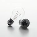 Classic Glass Light Bulb and Socket Isolated on White Background with Subtle Reflections and Shadow Isolated on White Background Royalty Free Stock Photo