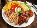 Classic Greek Meat Plate with French Fries Royalty Free Stock Photo