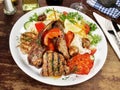 Classic Greek Meat Plate with Rice and Salad Royalty Free Stock Photo