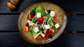 classic greek salad of organic vegetables with tomatoes, cucumber, red onion, olives and feta cheese Royalty Free Stock Photo