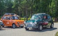 Classic green Morris Mini Cooper car driving