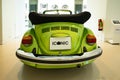 classic green vintage car Volkswagen VW Beetle Cabriolet, automotive nostalgia, display Iconic show Volkswagen Group Forum in