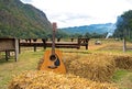 Classic guitar lying in front of the nature Royalty Free Stock Photo