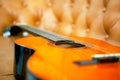 Classic Guitar In The Sofa Royalty Free Stock Photo