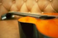 Classic Guitar In The Sofa Royalty Free Stock Photo