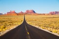 Classic highway view in Monument Valley at sunset, USA Royalty Free Stock Photo