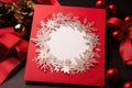 classic holiday card with a bright red border, embossed snowflakes, and festive wreath