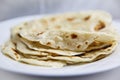 Classic homemade flour tortilla`s on white plate