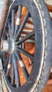 classic horse carriage wheel mounted for garden decoration Royalty Free Stock Photo