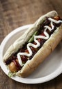 Classic hot dog with frankfurter sausage and sauces Royalty Free Stock Photo