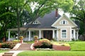 Classic House with flower garden Royalty Free Stock Photo