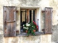 Old World European Farm House Window with Flowers Royalty Free Stock Photo