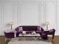 Classic interior in purple,pink and goldcolors.Sofa,chairs,sidetables with lamps,table with decor.White color walls with mouldings