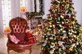 Classic interior room decorated in Christmas style with Christmas tree