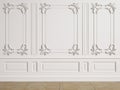 Classic interior wall with mouldings