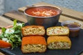 Classic, Italian arancini. deep fried Rice balls with minced meat and some vegetables inside. Tasty crunchy food with peanuts Royalty Free Stock Photo