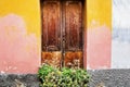 Classic Italian doors on walls painted pink and orange Royalty Free Stock Photo