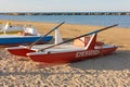 Classic italian rescue ship or rescue rowing catamaran on the sand on beach on the sunset. Royalty Free Stock Photo