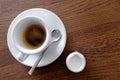 Classic italian single espresso in white cup next to a milk jug Royalty Free Stock Photo
