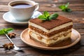 Classic Italian Tiramisu and coffee cup