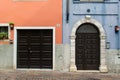 Classic Italy entrance doors on colorful wall