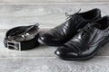 Classic leather shoes, belt and sunglasses Royalty Free Stock Photo