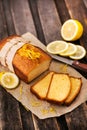 Classic lemon pound cake on rustic wooden background