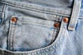 A classic light blue fashion jeans denim front pocket details surface texture background close up Royalty Free Stock Photo