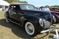 Classic Lincoln luxury car on field Royalty Free Stock Photo