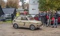 Classic little Polish compact car Polski Fiat 126p driving at a car show Royalty Free Stock Photo