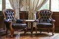 Classic luxury leather chair. Home and office interior high income style Royalty Free Stock Photo