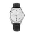 Classic luxury silver chronograph watch with white dial and black leather strap Royalty Free Stock Photo