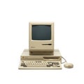 Vintage macintosh computer set with keyboard and mouse on white background Royalty Free Stock Photo