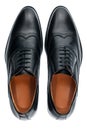 Classic male black leather shoes isolated on a white Royalty Free Stock Photo