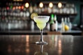 Classic margarita on a bar counter with a blurred bar background, generative AI