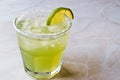 Classic Margarita Cocktail in Salted Glass with Lime and Crushed ice. Royalty Free Stock Photo