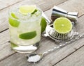 Classic margarita cocktail with salty rim on wooden table Royalty Free Stock Photo