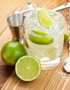 Classic margarita cocktail with salty rim on wooden table Royalty Free Stock Photo