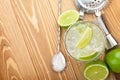 Classic margarita cocktail with salty rim on wooden table Royalty Free Stock Photo
