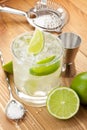 Classic margarita cocktail with salty rim on wooden table Royalty Free Stock Photo