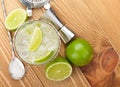 Classic margarita cocktail with salty rim on wooden table Royalty Free Stock Photo