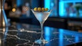 Classic martini with olives on elegant marble bar counter Royalty Free Stock Photo