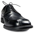 Classic men`s black club shoe, isolated detailed wide angle macro closeup, large detail