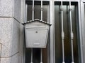 Classic metal mailbox on residential gate for security and style Royalty Free Stock Photo