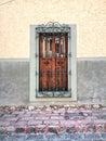 Classic mexican street san miguel de allende long window with traditional metal structure and stone road street