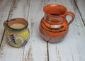 Classic Mexican style clay cups for coffee on wooden table Royalty Free Stock Photo